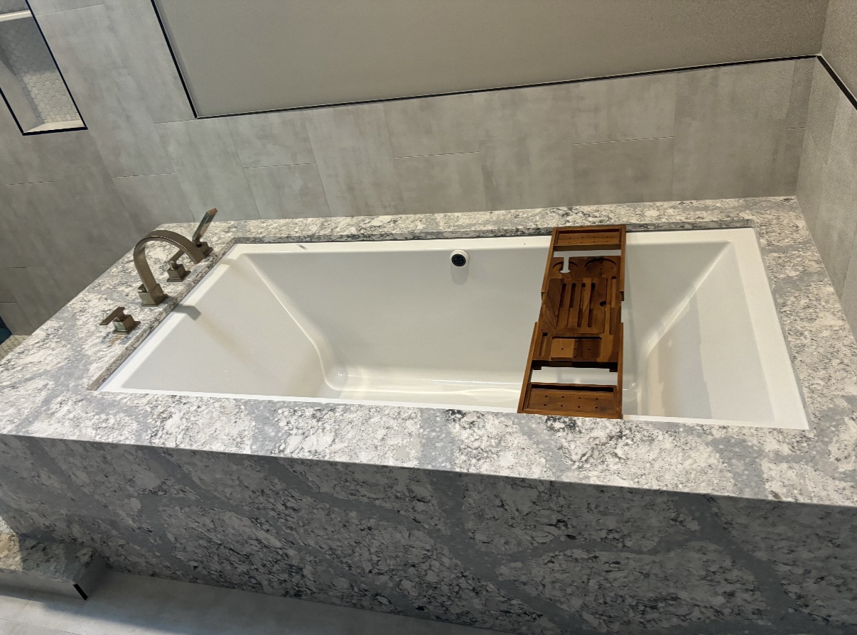 Home repair tools and equipment laid out for plumbing services